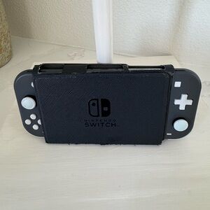 Nintendo Switch Lite Black with White Buttons - Handheld Gaming Console